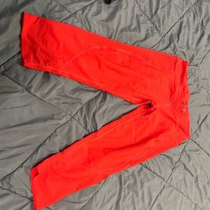 Victoria Sport red carpi leggings with pockets on both sides, size large